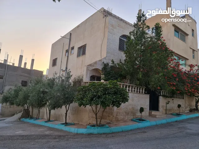 90 m2 More than 6 bedrooms Townhouse for Sale in Zarqa Al Tatweer Al Hadari Rusaifah