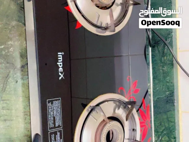 Brand Impex auto ignition black glass top stove & cylinder is available in excellent condition.