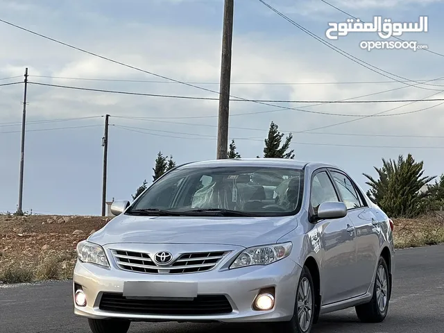 تويوتا كورولا 2013 لون سلفر مميزه فحص كامل كرت ابيض 7 جيد خصوصي اصل ممشى قليل