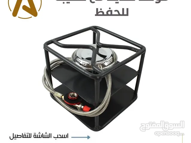 موقد حديد مع حقيبة للحفظ