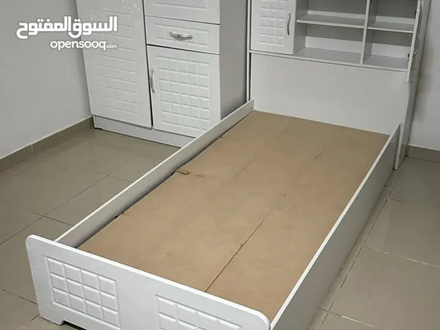 Bed and cupboard