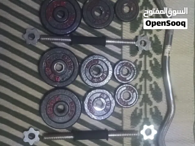 عدة رياضية منزلية - دامبلز + بار EZ