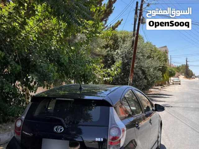 2013 تويوتا بريوس Prius C