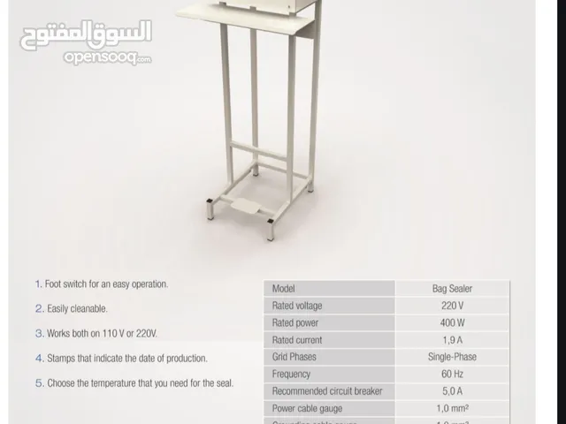 ماكنة تغليف يدوية مع ختم التاريخ