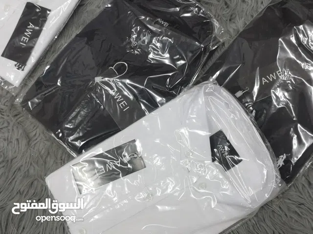 قمصان اكس فورد وبناطيل قماش ....