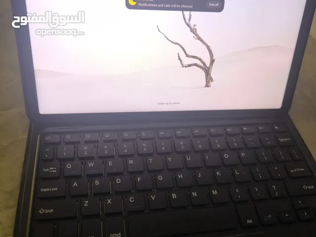 Xiaomi pad 5 with a tablet case and keyboard plus screen protectors