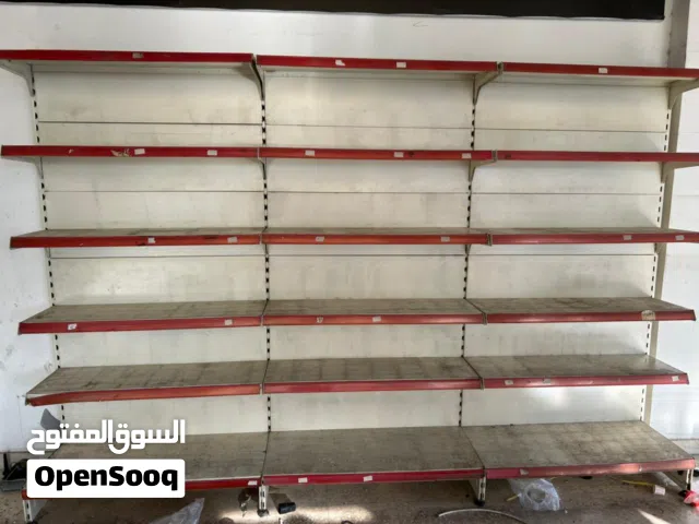 رفوف عرض محل زيت مركبات