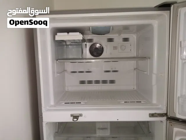 ثلاجه وغسالة . ومكيف