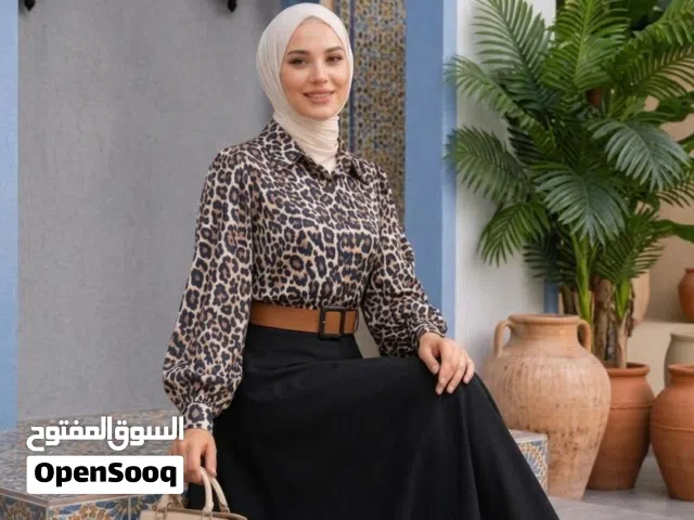 قميص تايجر وتنورة
