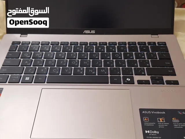 Asus laptop bearly used like new with BT Logitech mouse and mouse pad