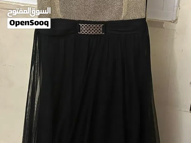 فستان سهرة لون اسود وذهبي طويل المقاس L او XL