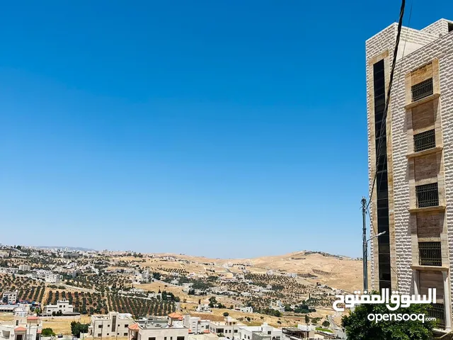 ارض ذات اطلالة عالية بانورامية في شفا بدران عيون الذيب . قطعة ارض 502 م تقع على 3 شوارع للبيع