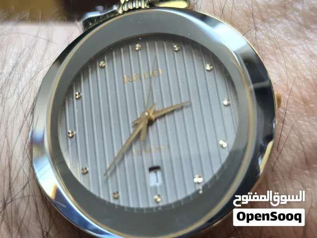 ساعة  رادو فلورنس - ساعة يد للجنسين، يوجد بها كسر بسيط في الزجاج الامامي وموضح بالصور