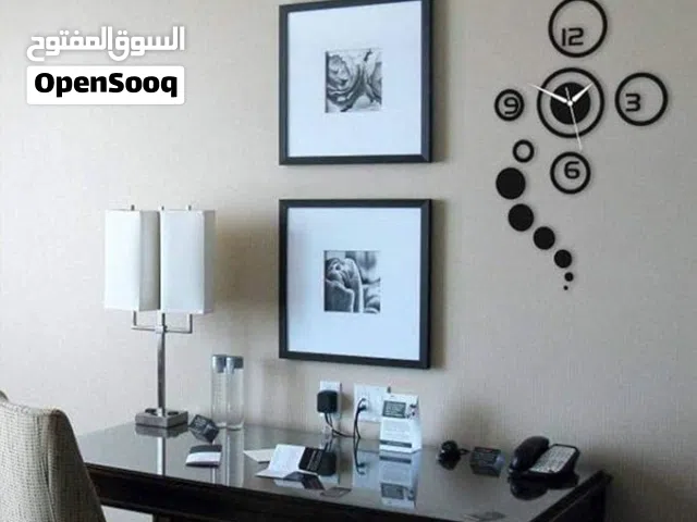 ساعة حائط ديكورية دائرية مودرن قابلة للصق – أسود
