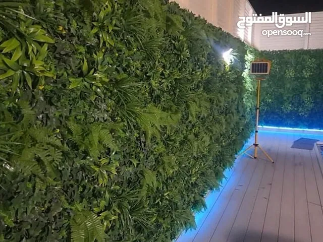 تنسيق الحدائق باشكال مختلفة و تركيب العشب الصناعي بأيدي ماهرة