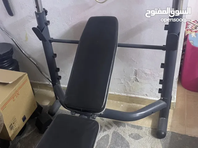 دكة جيم و اوزان 50 كيلو وبار طويل
