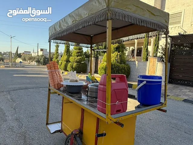عرباي " ذرة " للبيع كامل اغراضها ، غاز سفري جديد مُعبىء ، طونجرة ذرة ، تُرموس جديد