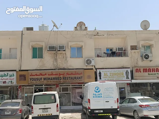 A commercial plot with a building (ground + four ) is available for sale للبيع ارض