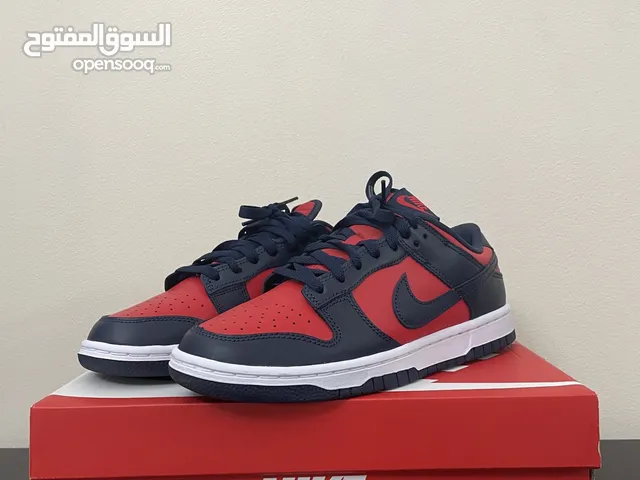 Nike dunk low retro “navy blue/red”