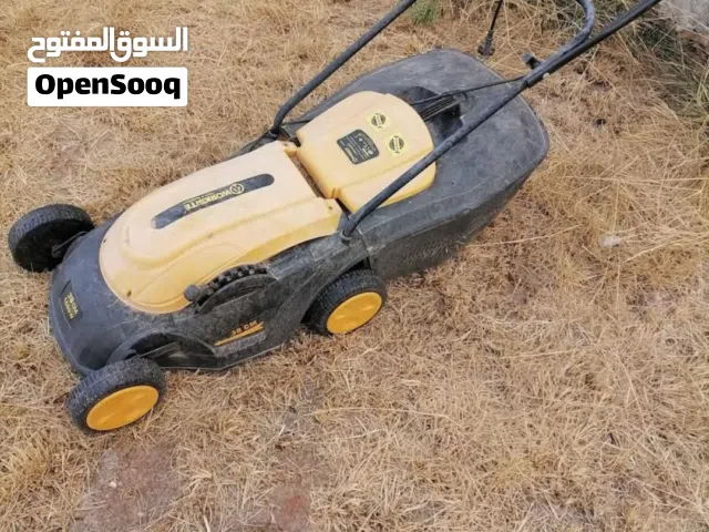 ماكينه قص النجيل