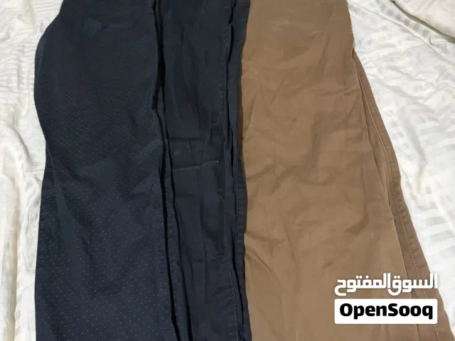 ملابس رجالي للبيع قمصان وتيشيرتات وبناطيل