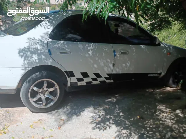 مازدا 323 لانتس