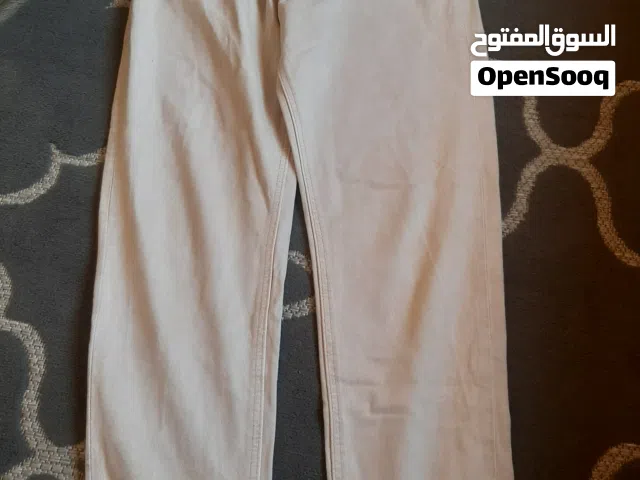 بنطلون باللون البيج جينز