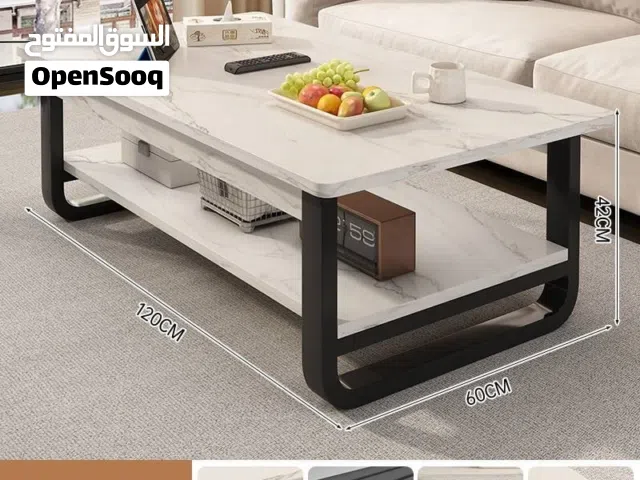 طاولة قهوة بتصميم رخامي عصري ولمسة فخامة واضحة • سطح أنيق مقاوم وسهل التنظيف ، مع رف سفلي عملي