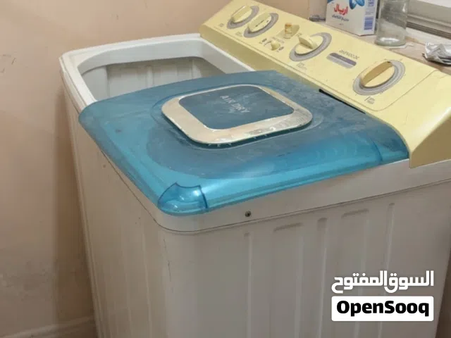 غسالة ملابس العادية