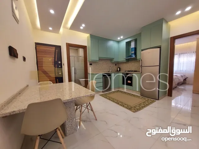 شقة طابق أرضي مع ترس لم تسكن للايجار في ام اذينة