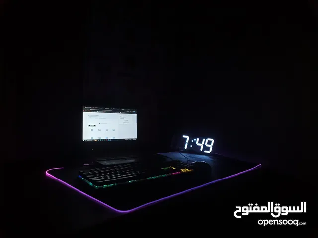 Mousepad , Keyboard , Clock and Mouse