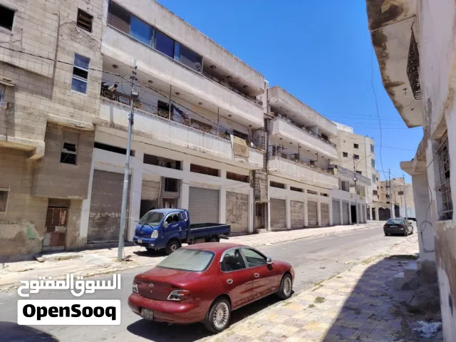عمارة تجاري للبيع بدخل سنوي 10% بالوحدات قريب دوار الشرق الأوسط دخلة ألبان ضبعة حي مواد البناء