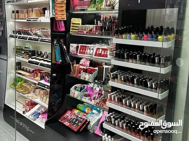 Shop for sale on Gudaibya Main Road, prime location w Decor & AC
