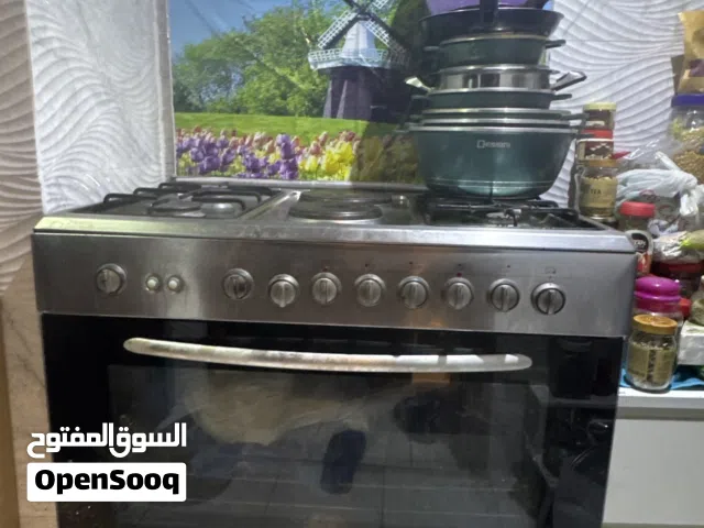 قاز بوش حجم كبير 6عيون 4نار اثنين كهرباء فرن شواية دجاج متحركه سعر الشراء 370سعر البيع 70