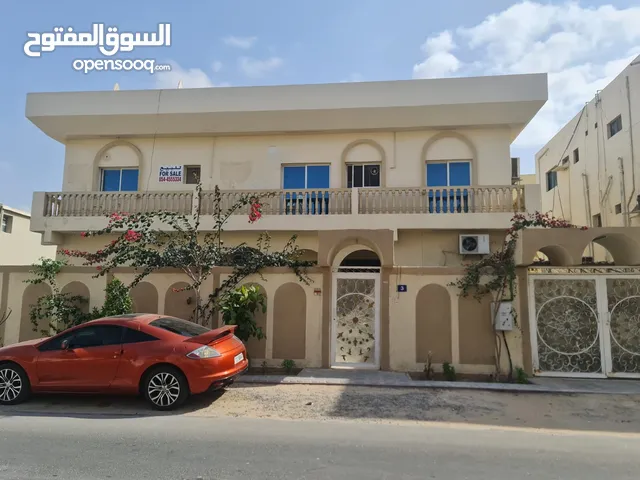 1000 m2 More than 6 bedrooms Villa for Sale in Ajman Al Bustan