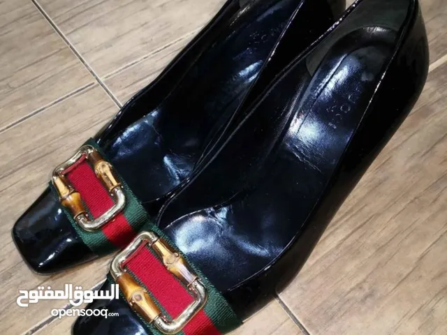 Gucci With Heels in Manama