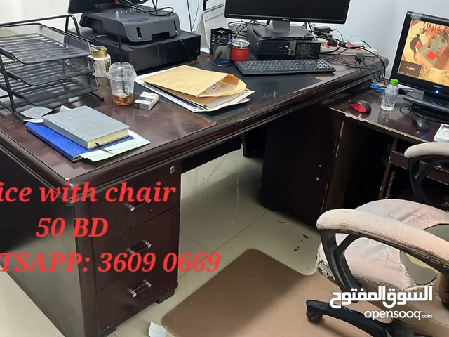 Office with chair and sofa