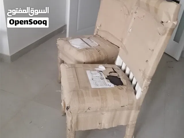 اتنين كراسي اكل جدد بغلاف متعهم