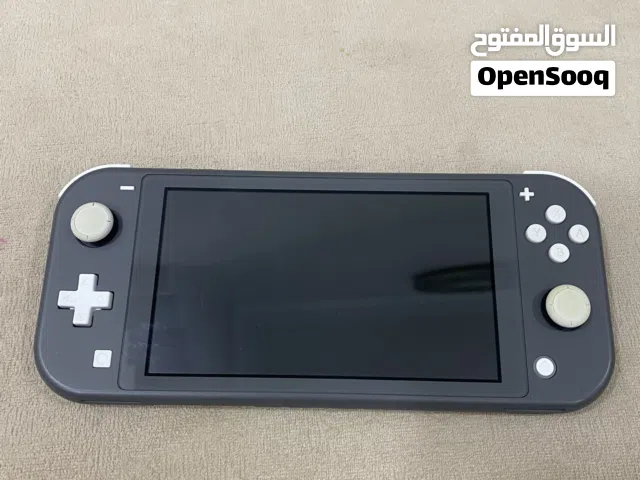 Nintendo Switch Lite اللون الرمادي و الابيض