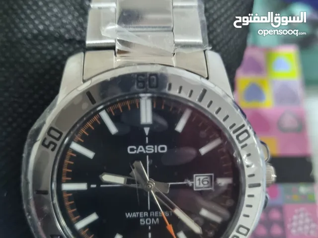 New Original Casio black background. Orange Dial