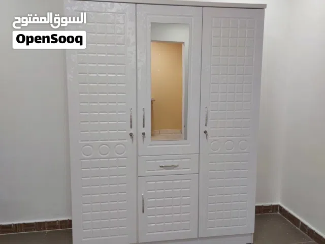 brand New three door cabinet with fixing