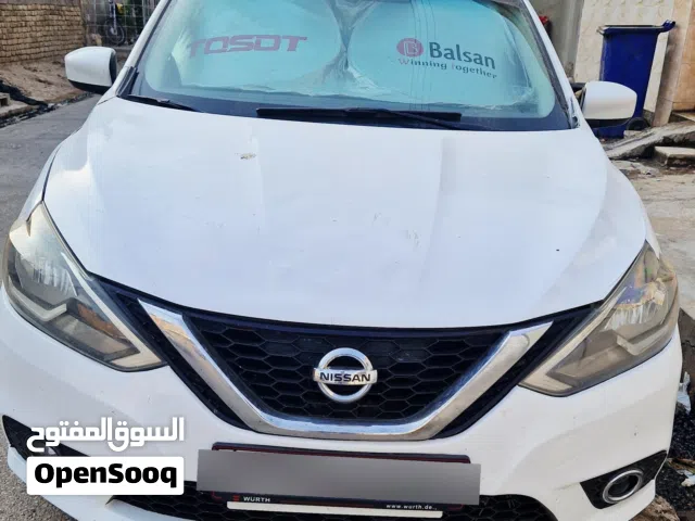 سيارة نيسان سنترا اللون ابيض موديل السياره سنة 2018 صنع  في دولة المكسيك الشقيقة