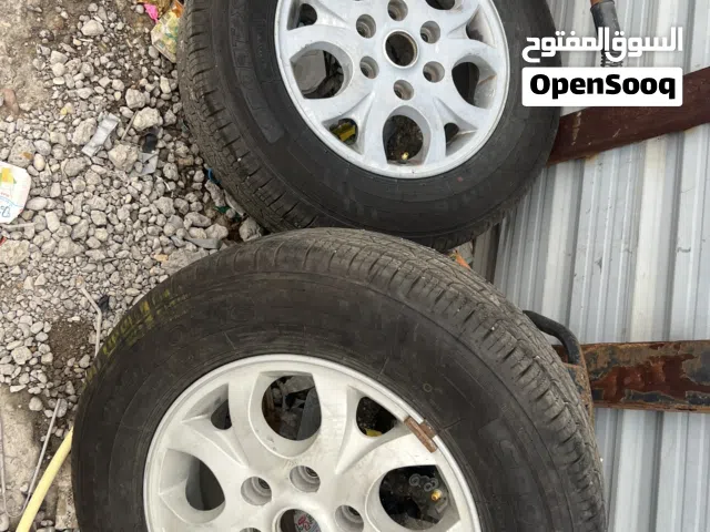 زوج ويلات مع تايرات شبه جديد حجم حجم 16 كيا ستار اكس