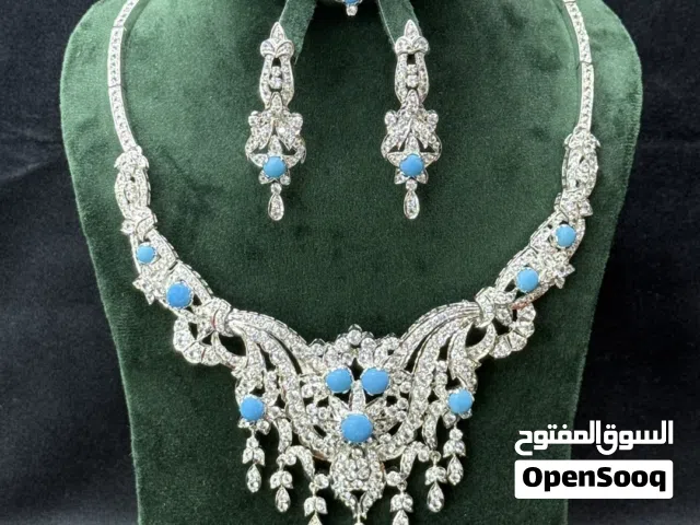 طقم نسائي فضة عيار 925 مطلي بالروديوم – فصوص زركون أبيض لامع + فصوص فيروز