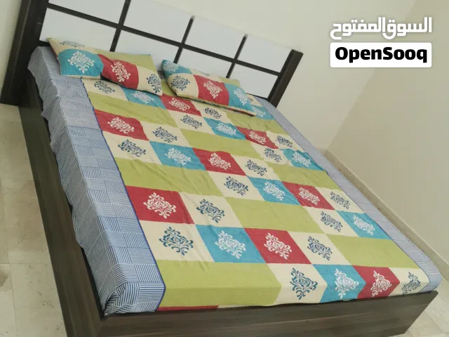 Wooden double bed