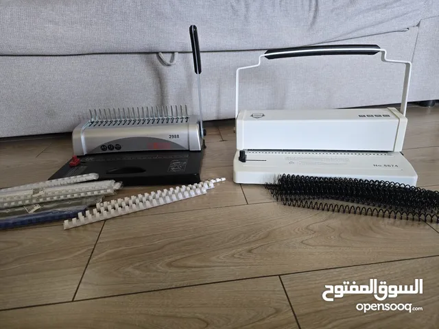 جهاز تخريم الأوراق والدفاتر binding machine