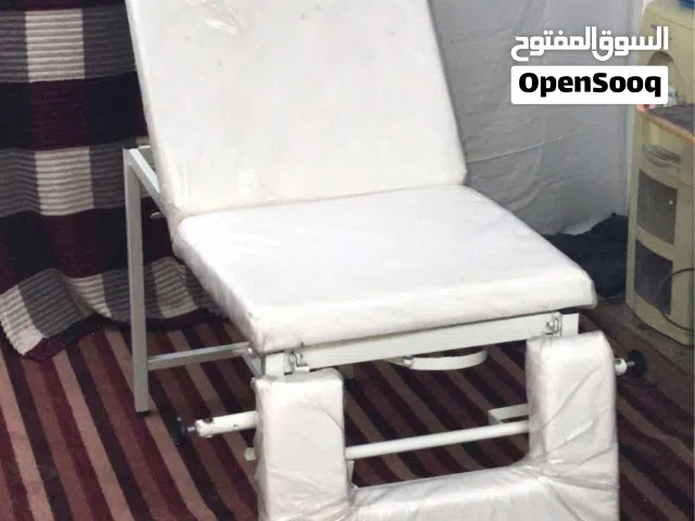 سرير كشف علاجي  و كرسي كشف علاجي نسائ للبيع