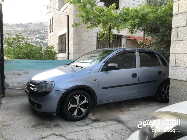اوبل كورسا 2003اتمات