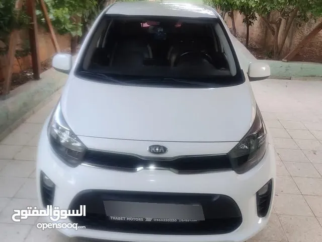 كيا بيكانتو مع بصمه بدون حوادث فل الفل ما عدا فتحه دهان اصلي
