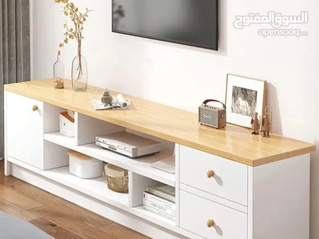 طاولة تلفزيون بلون أبيض وخشبي بتخطف الأنظار! المقاس 160*30*40 سم تصميم مودرن وعصري